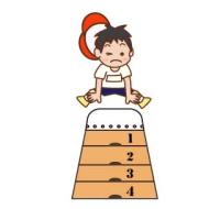 跳び箱を飛ぶ男の子