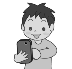 スマートフォンを使う子供(小学生の男の子)